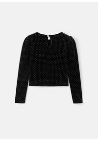 Svart sammetstopp med långa ärmar, som har en nyckelhålsöppning i ryggen och ett silverprickigt mönster över hela. Texturerad och mjuk yta.