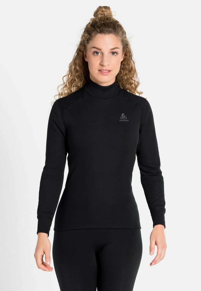 Black long-sleeve turtleneck made from soft fabric, featuring a fitted design and ribbed cuffs. Small logo on the upper left chest.