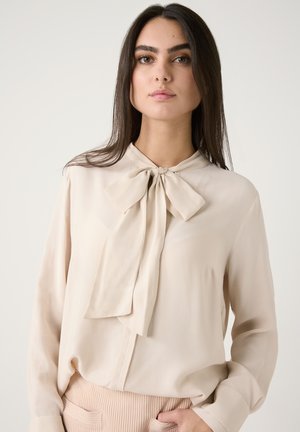 Bluse - powder creme
