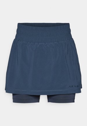 Jupe-short de sport bleu marine avec taille élastique froncée, design en couches et short intérieur intégré. Le matériau est léger et lisse.