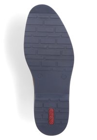 Suola in gomma blu scuro con motivo a trama testurizzata, caratterizzata da un logo rosso centrale e due segni circolari vicino al tallone per una migliore aderenza.