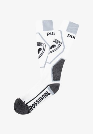 Valkoiset polvipituiset sukat, joissa on harmaat yksityiskohdat ja brändäys, sekä hexagonaalinen muotoilu ja vahvistetut tummanharmaat kantapää ja varvas.