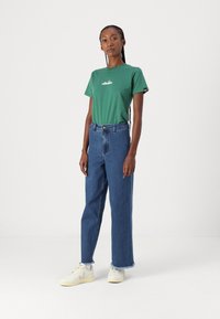 Billabong FREE FALL - Flared jeans - brew
