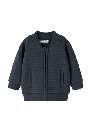 Dunkelgraue gesteppte Jacke mit Reißverschluss, geripptem Kragen, Bündchen, Saum und zwei Vordertaschen, für Kleinkinder oder junge Kinder entworfen.