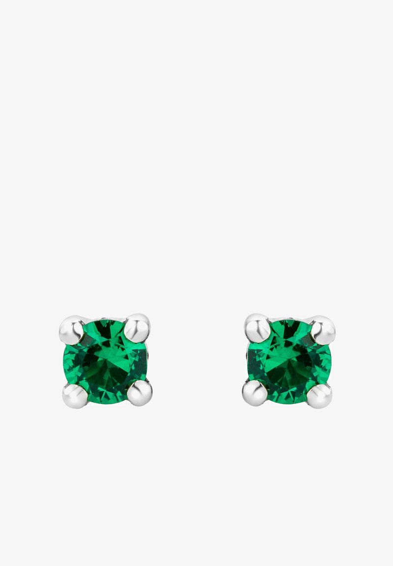 Grüne facettierte Kristallsteckerohrringe in vierkralligen Metallfassungen in Silberoptik. Kreisförmige Form mit polierter Oberfläche.