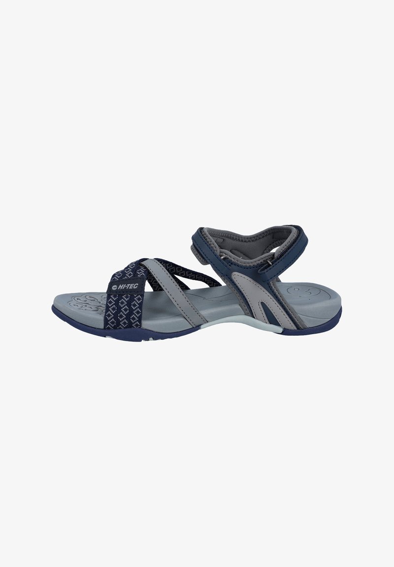 Single navy and gray open-toe sports sandal with adjustable straps and textured footbed, designed for outdoor use.