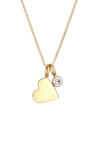 Goldenes Herzpendant an einer dünnen Kette, mit einer glatten Oberfläche und einem kleinen runden Kristallakzent, der mit einer Schlaufe befestigt ist.