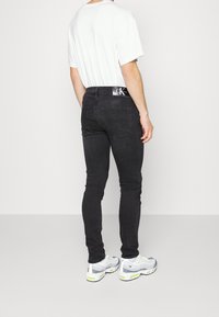 Calvin Klein Jeans Vaqueros pitillo - black denim
