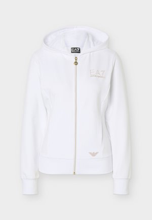 White zip-up hoodie with gold EA7 Emporio Armani logo on chest and gold emblem near hem, featuring a hood and long sleeves.
