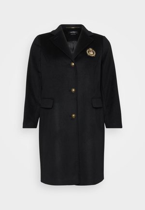 Manteau en laine noir avec un col cranté, boutons dorés et un emblème décoratif sur la poitrine gauche ; dispose de deux poches avant.