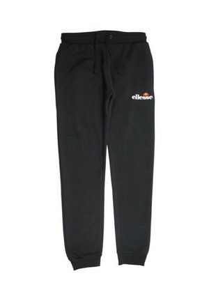 Pantalon de survêtement noir en tissu doux avec une taille à cordon, présentant un logo blanc "ellesse" sur la cuisse droite. Chevilles bord-côte.