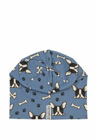 Blå tygbeanie med ett tryckt mönster av franska bulldogar, ben och tassavtryck. Har en snurrdesign upptill. Mjuk textur.
