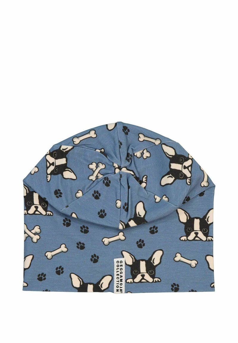 Blå tygbeanie med ett tryckt mönster av franska bulldogar, ben och tassavtryck. Har en snurrdesign upptill. Mjuk textur.