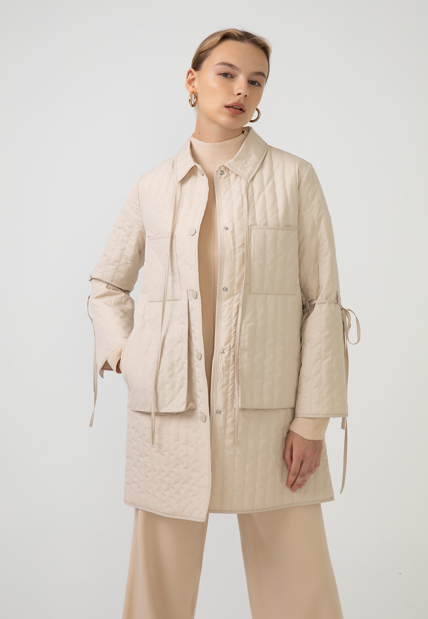 beige quilted jacket