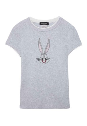 T-shirt gris clair à manches courtes avec un motif graphique à l'avant représentant le visage souriant de Bugs Bunny, affichant de grandes oreilles et des moustaches.