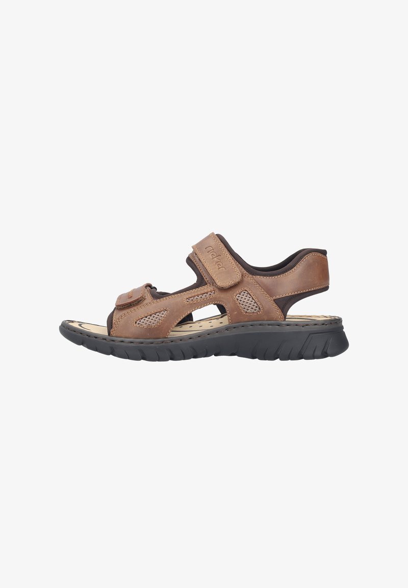 Sandale ouverte en cuir marron avec des sangles réglables en Velcro, semelle noire rembourrée et panneaux latéraux en mesh pour la respirabilité.