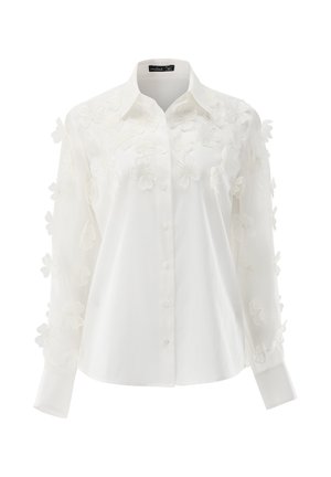 Weiße Hemdbluse mit floraler Stickerei auf den Ärmeln. Weicher Stoff mit glatter Textur und tailliertem Schnitt.