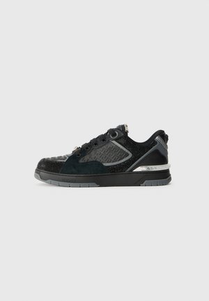 Black athletic shoe with mixed materials including mesh and suede, featuring a textured pattern and metallic accents on the heel and side.