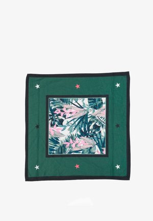 Grüne dekorative Decke mit einem zentralen Muster tropischer Blätter in Pink und Blau, umrahmt von einem dunklen Rahmen und Sternelementen in Rot, Weiß und Schwarz.