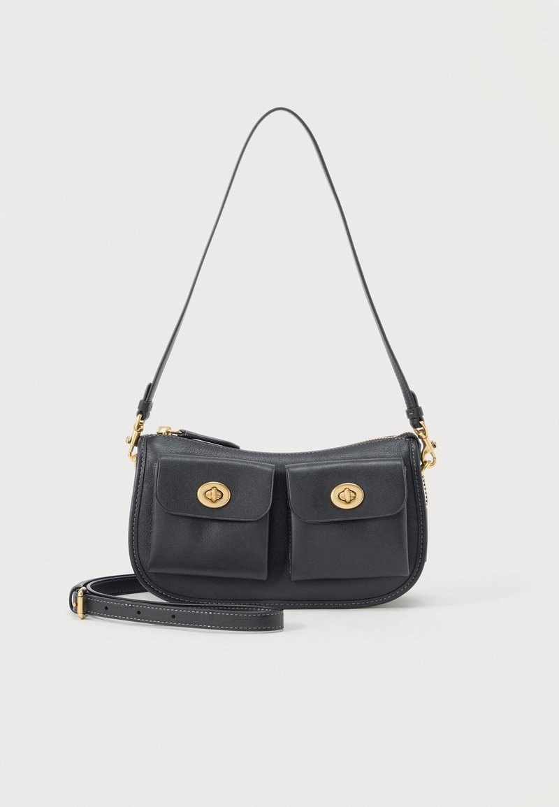 Μαύρο δερμάτινο τσαντάκι ώμου με δύο εμπρόσθιες τσέπες με καπάκι και κλειδώματα με χρυσή απόχρωση, καθώς και αποσπώμενο λουρί για φορετό χιαστί.