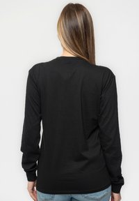 Paradiso Clothing ED SHEERAN BAD HABITS  - Long sleeved top - black