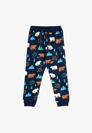 Marineblå pyjamasbukser med bjørn- og bjergmønstre i brune, hvide og grønne farver. Har en snøre i taljen og ribbede ankler.