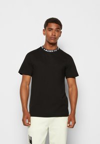 Lacoste T-shirt med print - noir