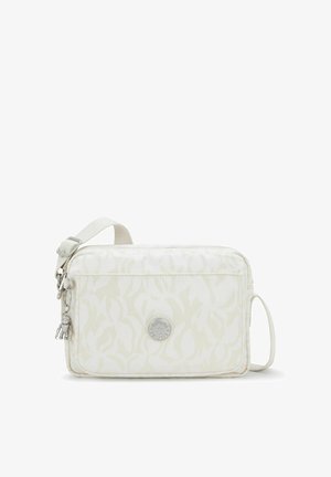 White fabric shoulder bag with a subtle floral pattern, rectangular shape, silver hardware, and a detachable charm. Crossbody strap included.