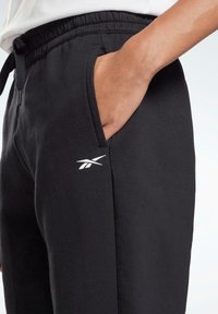 Reebok Träningsbyxor - black