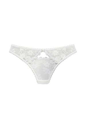 White lace thong featuring floral patterns, semi-sheer fabric, scalloped edges, and a cutout design at the front. Soft waistband.