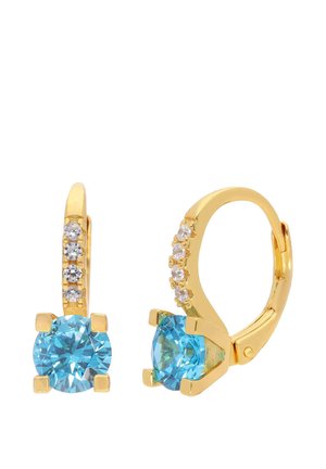 Gold hoop earrings with four small clear stones on the hoops and large round blue gemstones set at the bottom.