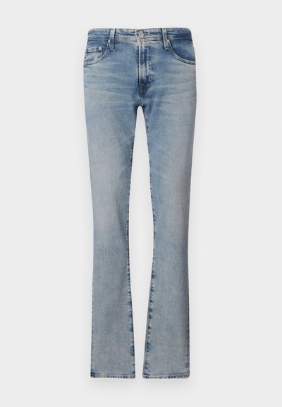 Heledad sinine denim flared teksased keskmise kõrgusega talje, viie taskuga ja pleekinud viimistlusega, varustatud tõmbluku ning metallist nööbiga.