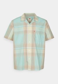 Camicia a maniche corte con bottoni in un motivo a quadri blu chiaro, beige e verde. Presenta una singola tasca sul petto e un morbido tessuto di cotone.