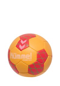 Pomarańczowa i żółta piłka ręczna dla dzieci z sześciokątnym wzorem, ozdobiona czerwoną diamentową grafiką i zielonymi konturami, z logo "hummel CLASSIC KIDS."