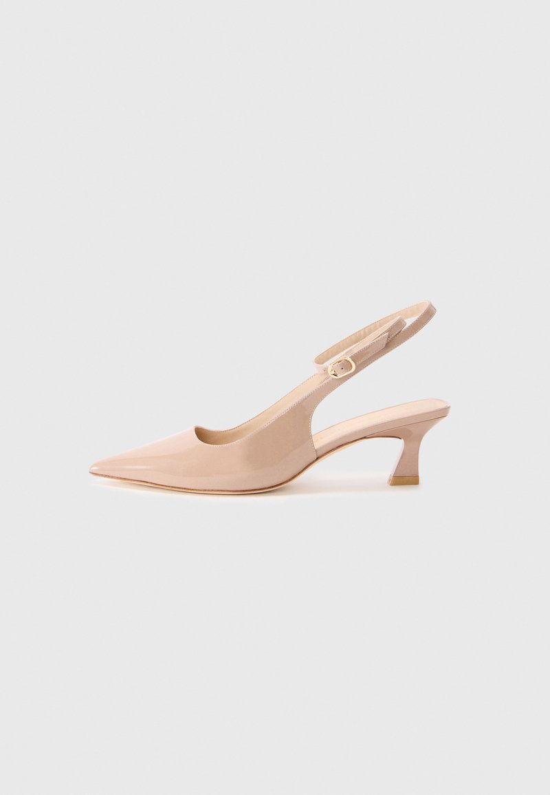Nude patent leather slingback pump, pointed toe, low block heel, adjustable strap with buckle, smooth texture, minimalistic design.