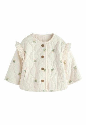 Giacca imbottita color crema per bambini piccoli con piccoli motivi floreali, bottoni di legno sul davanti, tasche laterali e rifiniture in pizzo arricciato sulle spalle.