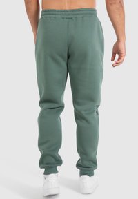 Smilodox CASUAL SPORT FIERO - Trainingsbroek - hellgrün