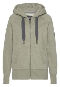 Lichtolijfgroene zip-up hoodie gemaakt van zachte stof. Voorzien van een capuchon, twee zakken aan de voorkant, geribbelde manchetten en donkerdere trekkoorden.