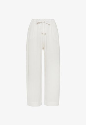 White loose-fit textured pants with elastic waistband and front tie, straight legs, ankle length.