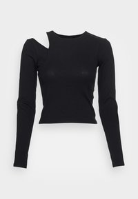 Svart ribbad långärmad topp med en unik asymmetrisk utskärning på vänster axel, cropped design och slät textur.