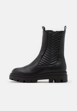 Botines con plataforma - black
