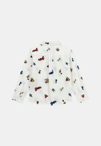 Camicia bianca a maniche lunghe con modelli ricamati colorati che includono simboli, parole e forme. Polsini con bottoni e design del collo classico.