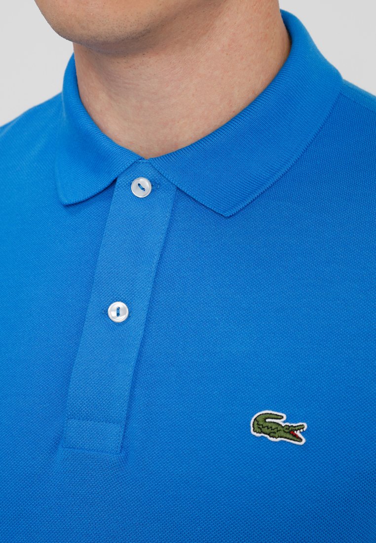royal blue lacoste polo shirt