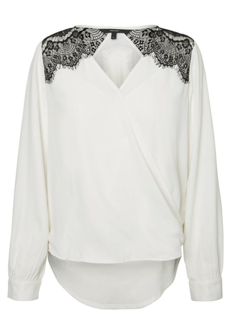Blusa bianca con scollatura a V e maniche lunghe, caratterizzata da dettagli in pizzo nero sulle spalle. Tessuto morbido e liscio con un orlo arrotondato.