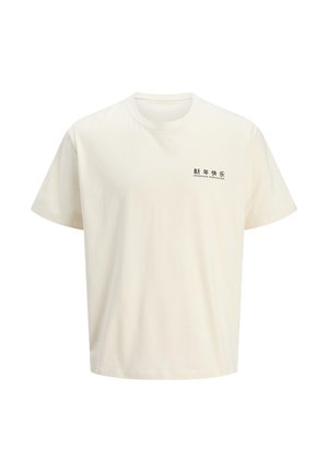 Crème-kleurig katoenen t-shirt met korte mouwen en een ronde halslijn. Voorzien van een zwart tekstontwerp op het linkerborstgebied.