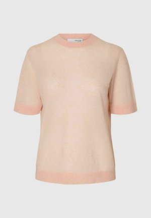 Maglione in morbido rosa a maniche corte con collo, polsini e orlo a coste, mostrato su uno sfondo neutro.