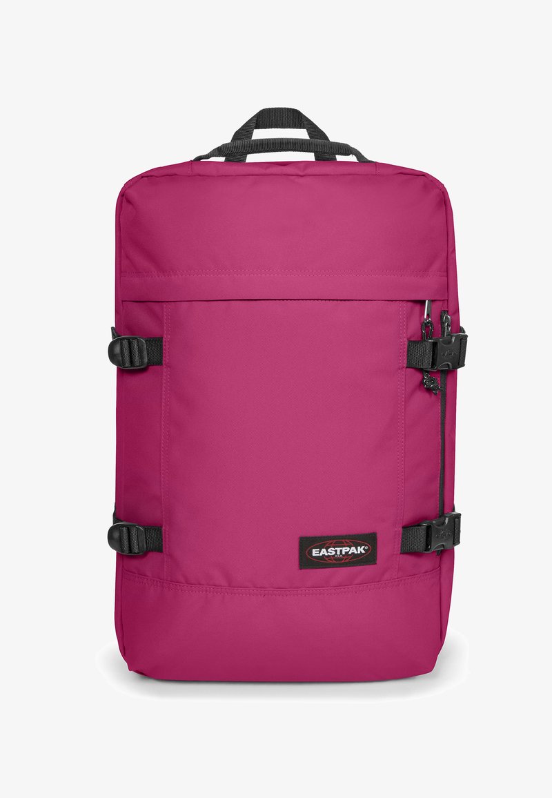 Sac à dos magenta en tissu lisse et durable, doté de bretelles réglables, de fermetures à boucle et d'une poche zippée à l'avant ; arborant le logo Eastpak.