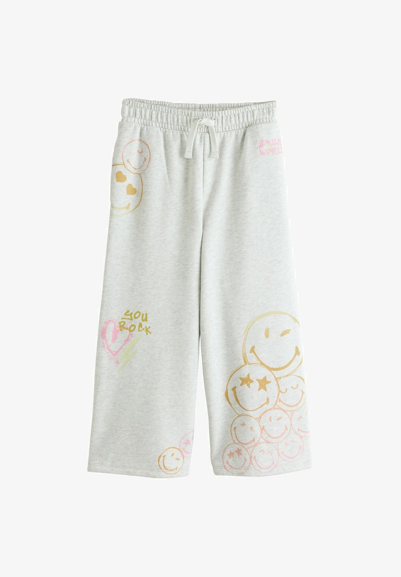 Pantalon de survêtement pour enfants gris clair avec taille élastique, cordon de serrage, visages souriants colorés et phrases « You rock » et « Smiley World » imprimées.
