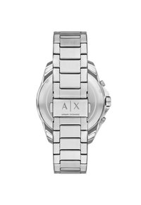 Rozsdamentes acél karórája van, fényes fém lánccal. Az „A|X ARMANI EXCHANGE” feliratú logó gravírozva van a csaton, kerek tok, minimalista számlap.