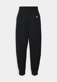 Černé vysoké legíny s elastickým pasem a malým bílým logem Adidas na levém boku.